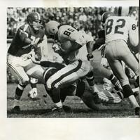 [Game photo highlighting #85 Chester "Cookie" Gilchrist of the Toronto Argonauts]
