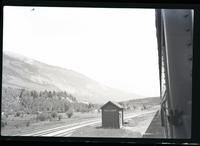 [View of the side of a mountain from a train]