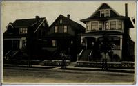[Three dwellings on a residential street in Vancouver, B.C.]