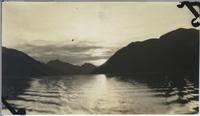 [View of a sunrise or sunset over Muchalat Arm, B.C.]