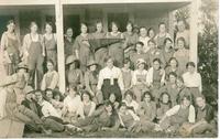 [Group portrait of women in front of a building in an unknown location]