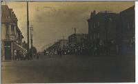 [Ladysmith High School procession down a street in Ladysmith, B.C.]