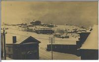 [View of a snow-covered town in an unknown location]