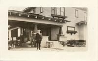 [Doukhobor man standing in front of Hotel Lethbridge in Lethbridge, Alberta]