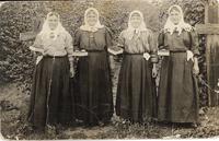 [Group portrait of four Doukhobor women in an unknown location]