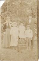 [Group portrait of a Doukhobor family in an unknown location]