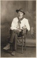 [Portrait of a Doukhobor man sitting in a chair in an unknown location]