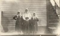 [Group portrait of three Doukhobor women in an unknown location]