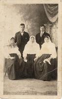 [Group portrait of three Doukhobor women and two men in an unknown location]