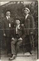 [Group portrait of three Doukhobor men in an unknown location]