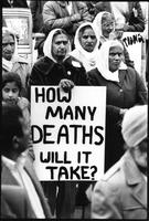 A Time To Change Exhibition. Photo 30 by Craig Berggold. CFU executive member Pritam Kaur and her farm worker friends protest the exclusion of farmworkers from health and safety regulations. Vancouver, BC, April 10, 1983.