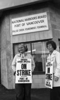 ILWU [International Longshore and Warehouse Union] mmbrs. picket outside Nat. Harbours Board [Port of Vancouver]