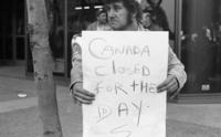 [Man holding a poster that says "Canada closed for the day" at the British Columbia Federation of Labour "Out to fight controls" demonstration]
