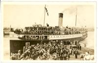 [Photo of passenger ship at dock]