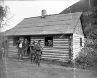 RCMP at Dukhobor log cabin