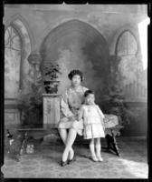 Studio portrait of Chinese woman and child