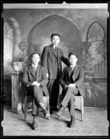 Studio portrait of 3 Chinese men
