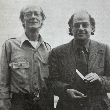 Black and white image of Warren Tallman standing to the left of Allen Ginsberg